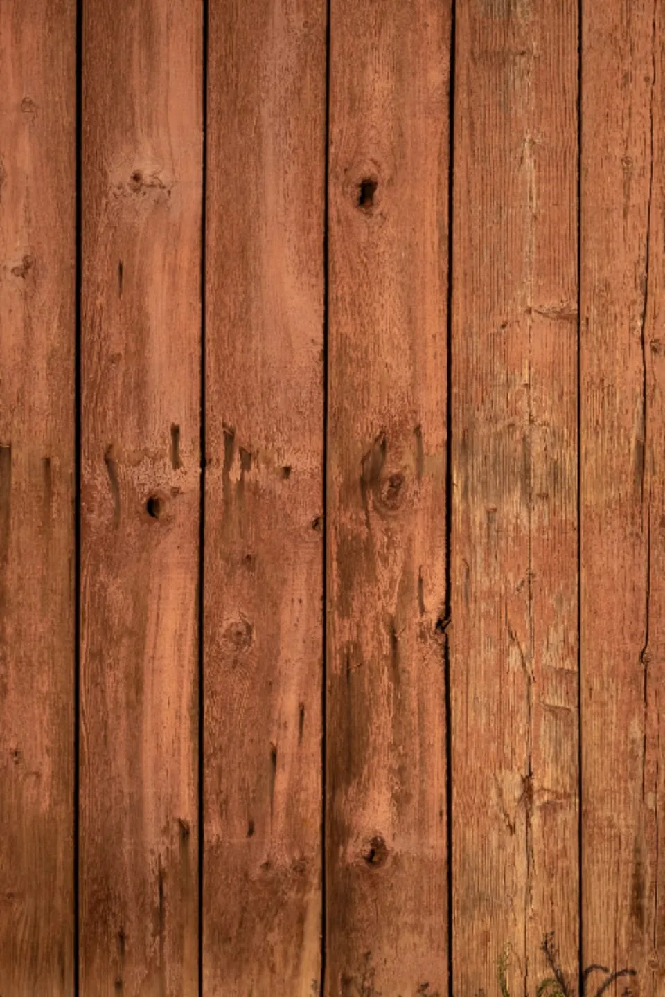 Warm vertical cedar cladding boards.